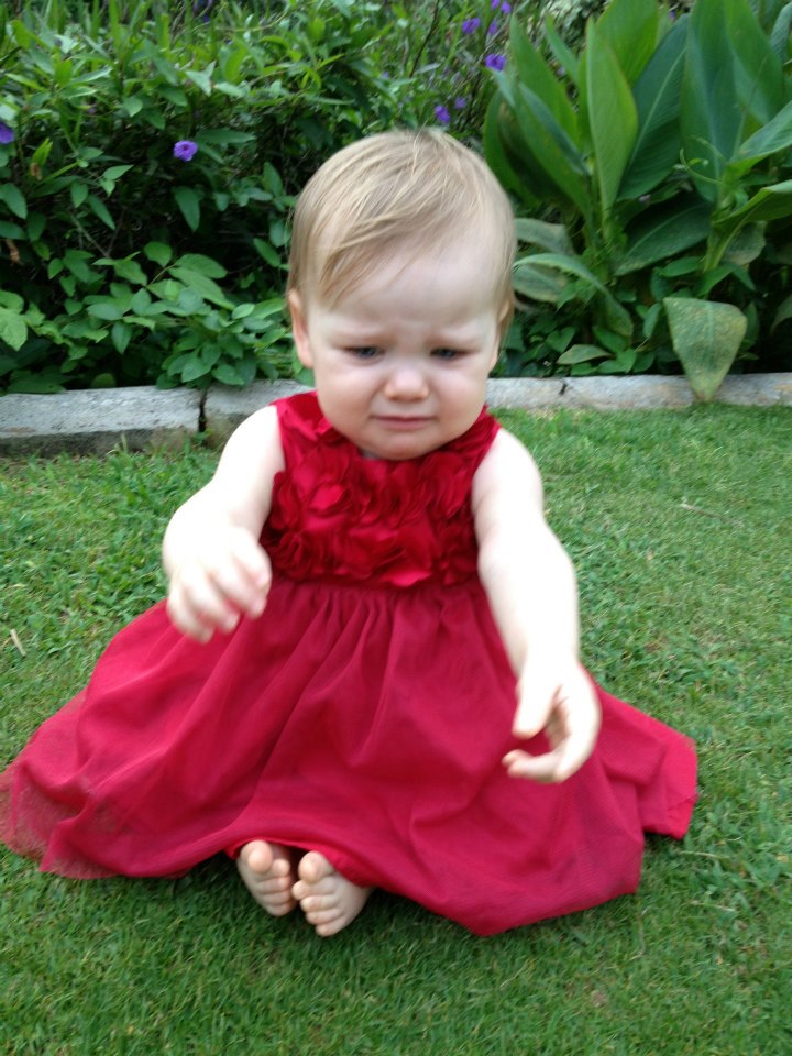 Crying because we put her on the grass. 