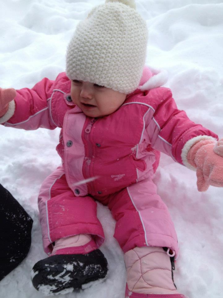 Crying because we put her in the snow.  We are so mean. 