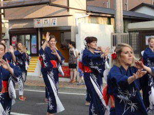 Bon-Odori dancing.  You can see that I'm the spaz whose hand movements are not matching up with any of the other dancers.  