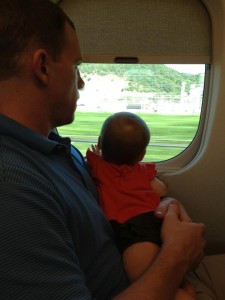 Checking out the views from the Shinkansen, the awesome bullet train.