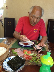 Kenji doling out some homemade sushi.