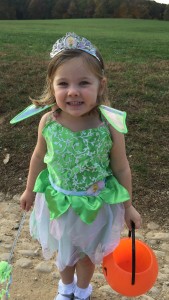 Freezing in her costume, but refusing to ruin her outfit. 